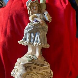 Vintage Ceramic Figurine with Red and Cream Accents
